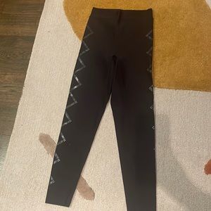 Ultracor black leggings with design down the leg